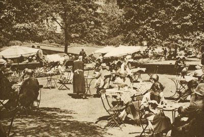 A continental lunch-time scene in the Embankment Gardens, Charing Cross by English Photographer